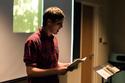 Cain ’13 reads from his recently published work, Kids of the Black Hole; Photo by Dan Tu '20